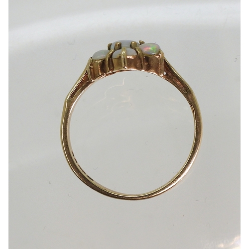 747 - A 9ct gold opal flower ring, size K1/2, weight 2gms...