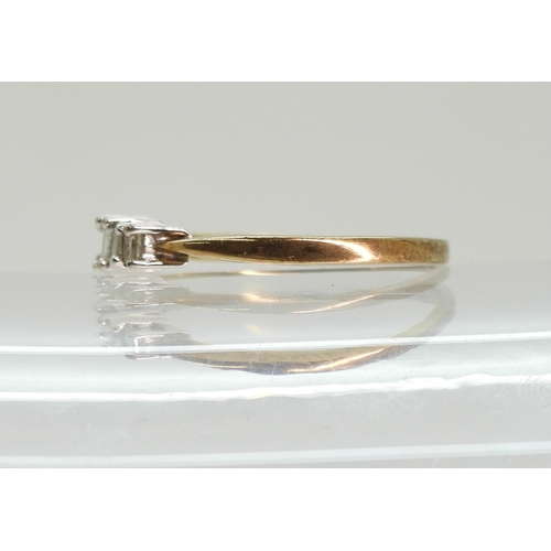 749 - A 9ct gold three princess cut diamond ring, finger size P1/2, weight 1.7gms...