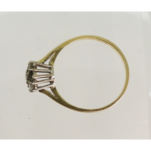 750 - An 18ct gold diamond flower ring, (one diamond missing) size P1/2, weight 2.5gms...