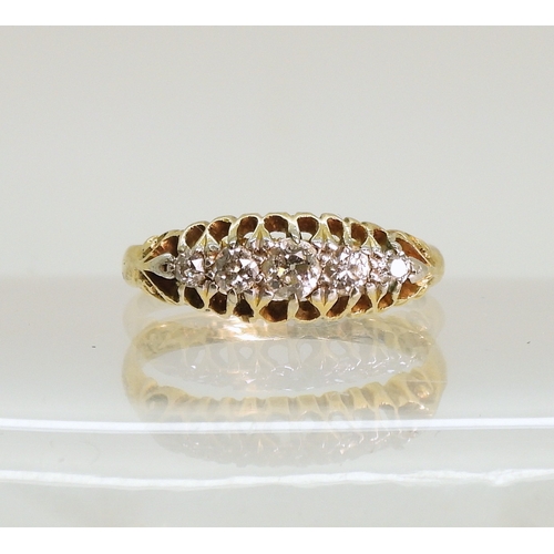 751 - An 18ct gold five stone diamond ring, size K, weight 2.5gms....