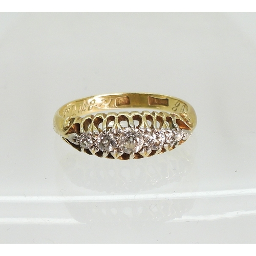 751 - An 18ct gold five stone diamond ring, size K, weight 2.5gms....