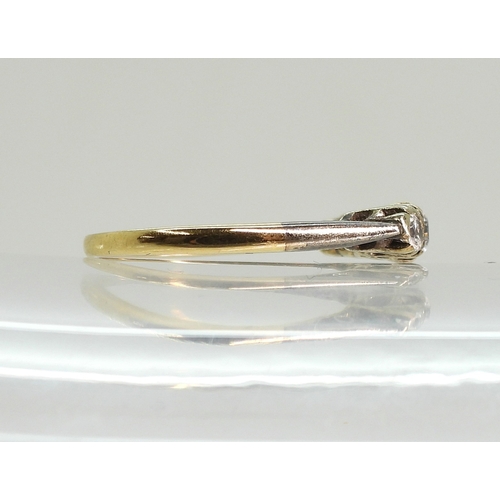 756 - An 18ct gold blue and clear gem set ring,size M1/2, weight 2.3gms...