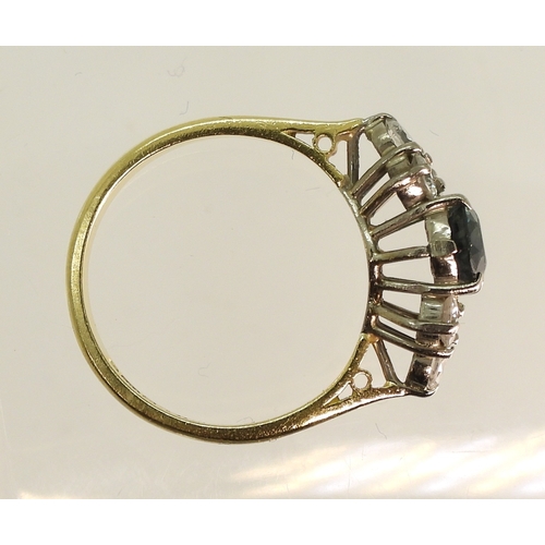 757 - An 18ct gold sapphire and diamond cluster ring, size N, weight 4gms...