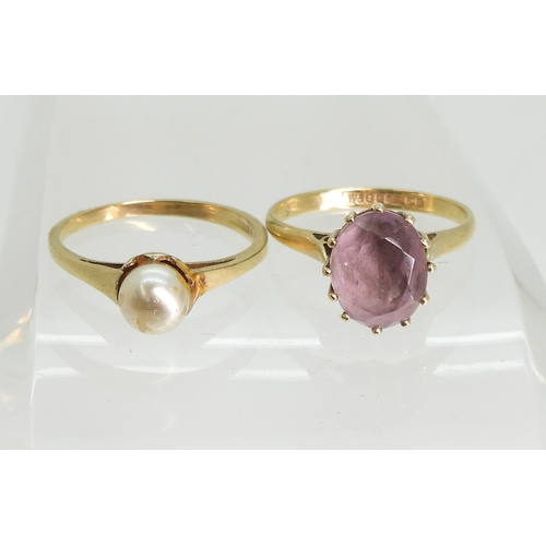 758 - A 9ct amethyst ring, size N, and a 9ct gold faux pearl ring, size N, weight combined 4.1gms...