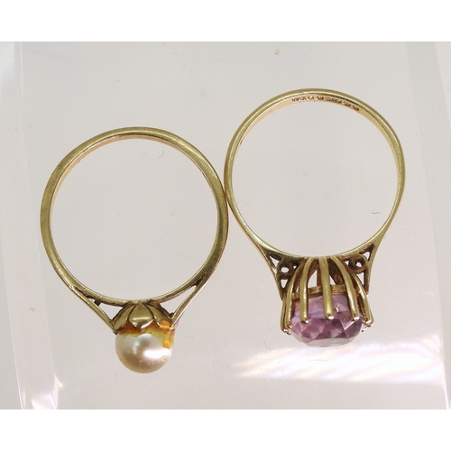 758 - A 9ct amethyst ring, size N, and a 9ct gold faux pearl ring, size N, weight combined 4.1gms...