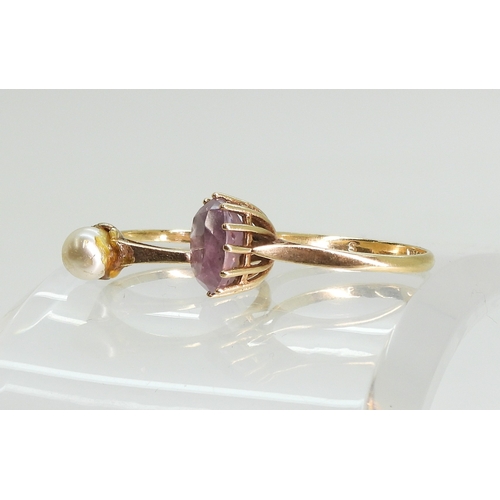 758 - A 9ct amethyst ring, size N, and a 9ct gold faux pearl ring, size N, weight combined 4.1gms...