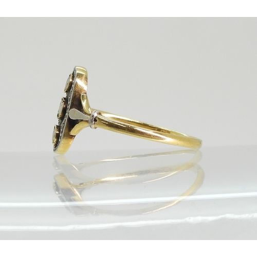 763 - A vintage pearl and diamond accent ring, made in yellow and white metal with fleur de lis shoulders,... 