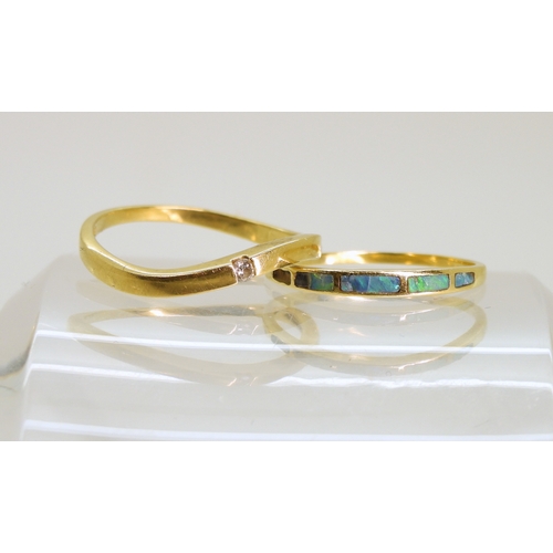 769 - An 18ct (af) opal set ring, size M1/2, together with an 18ct&nbsp; wave shaped band ring set with a ... 
