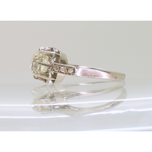 2739 - A SUBSTANTIAL DIAMOND RINGthe white metal shank is set with a cushion cut diamond of estimated appro... 