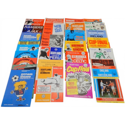 9014 - An early Alex Ferguson autograph; and a collection of 1960s and 70s-era football programmes, includi...