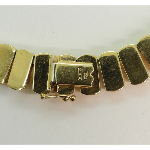 2700 - AN ITALIAN MADE NECKLACEmade in 18ct gold, the statement fringe necklace is 41.5cm long and 1.2cm wi... 