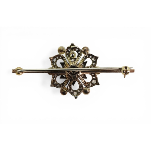 2703 - A PEARL & DIAMOND BROOCHfinely mounted in yellow and white metal. Diameter of the&nbsp; central ... 