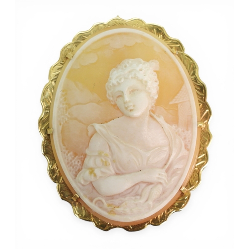 2705 - A SHELL CAMEO BROOCHmounted in 14k gold, with London import marks for 1975, the cameo finely carved ... 