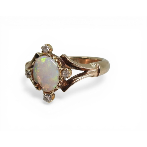 2707 - AN OPAL & DIAMOND RINGmade in 9ct rose gold, finger size N, weight 4.4gms