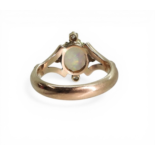2707 - AN OPAL & DIAMOND RINGmade in 9ct rose gold, finger size N, weight 4.4gms