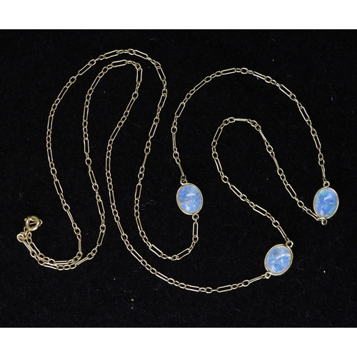2708 - AN OPAL NECKLACEthe 18ct gold chain is hung with three spectacle set jelly opals of approx 10mm x 8m... 