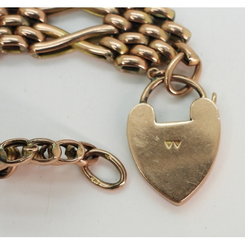 2710 - A GATE BRACELETmade in 9c rose gold with unusual crossed links, and heart shaped clasp. Length 18cm,... 