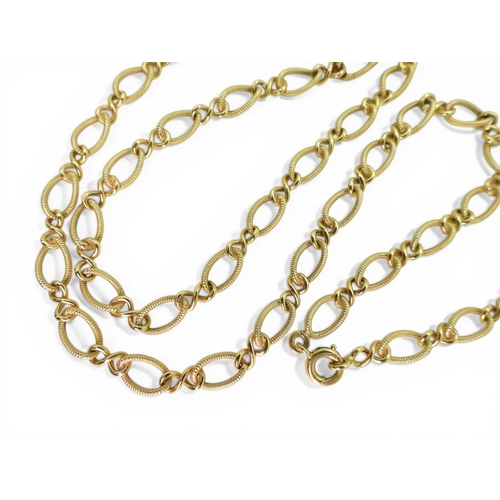 2714 - A FANCY CHAINmade in 18ct gold with twist pattern links, length 70cm, weight 16.2gms... 