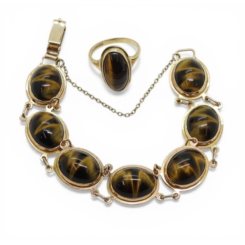 2718 - A TIGER'S EYE BRACELETmade in 9ct gold, set with oval tiger's eye gemstones of approx 15.5mm x 11.5m... 