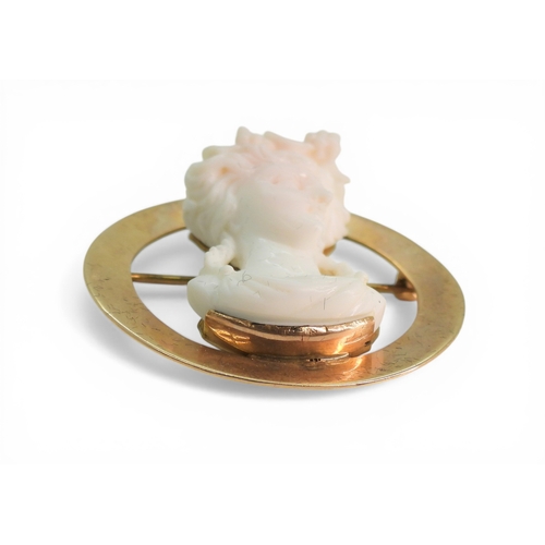 2727 - A CONCH SHELL CAMEO BROOCHunusually, deeply carved as a maiden in profile, mounted in 10k gold, diam... 