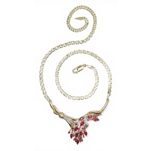2741 - A RUBY & DIAMOND NECKLACEmounted in 9ct gold, the marquis and round cut ruby spray is enhanced w... 