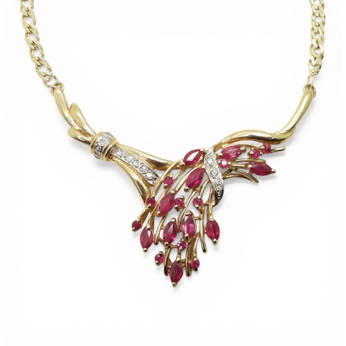 2741 - A RUBY & DIAMOND NECKLACEmounted in 9ct gold, the marquis and round cut ruby spray is enhanced w... 