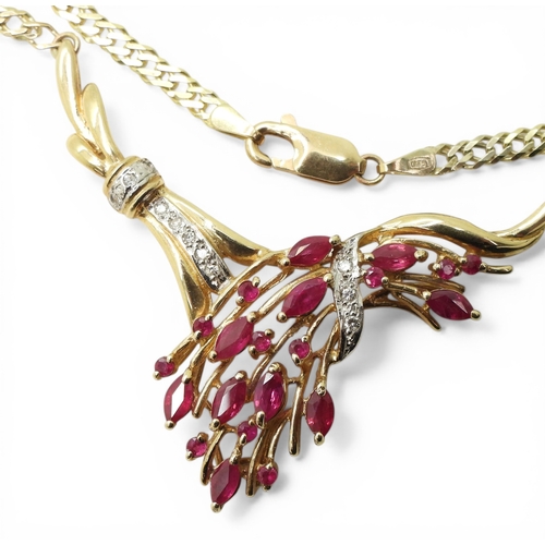 2741 - A RUBY & DIAMOND NECKLACEmounted in 9ct gold, the marquis and round cut ruby spray is enhanced w... 