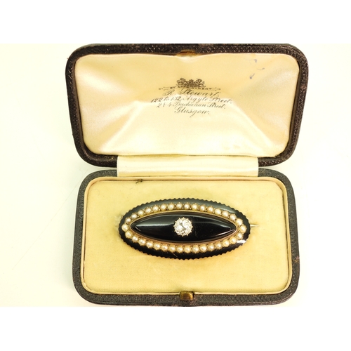 2744 - A DIAMOND SET MOURNING BROOCHmounted in yellow metal with panels of onyx, black enamel and split pea... 