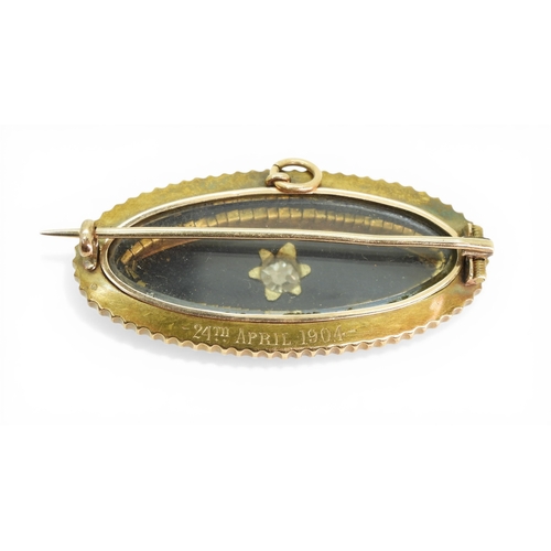 2744 - A DIAMOND SET MOURNING BROOCHmounted in yellow metal with panels of onyx, black enamel and split pea... 