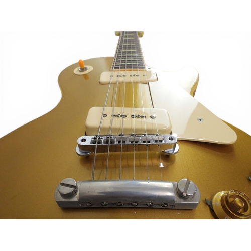 5022 - GIBSON - 1991 Historic '56 Reissue Gold Top Les Paul Electric Guitar. Mahogany back with Maple top. ... 