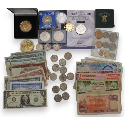 5010 - A lot comprising twelve George V florin coins together with commemorative coins an Elizabeth II 1953... 