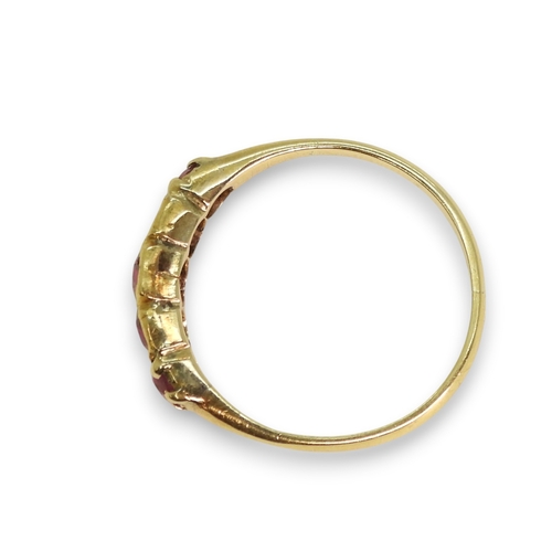 772 - An 18ct gold ruby five stone ring, size M1/2, weight 2.3gms