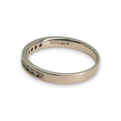 773 - A platinum diamond set half eternity ring, size L1/2, weight 2.9gms.