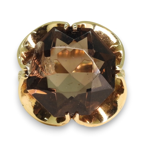 779 - A 9ct gold large smoky quartz ring, diameter 15.5mm, size N1/2, weight 6gms