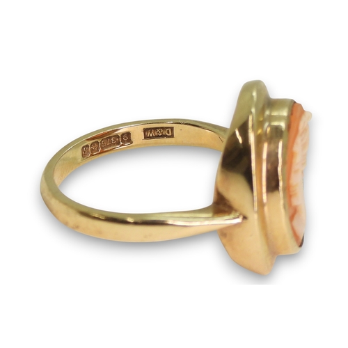 780 - A yellow metal turquoise set dome ring, size approx N1/2, weight 2.8gms, a 9ct gold cameo ring size ... 