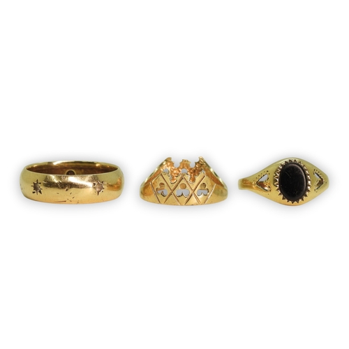 782 - A 9ct gold wedding ring set with clear gems (two missing) size R, a 9ct onyx signet ring size O1/2 a... 