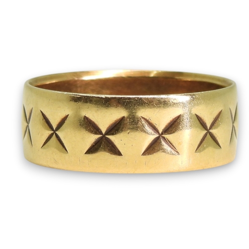 783 - A 9ct gold retro engraved wedding ring, size Q1/2, weight 3.4gms