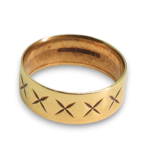 783 - A 9ct gold retro engraved wedding ring, size Q1/2, weight 3.4gms