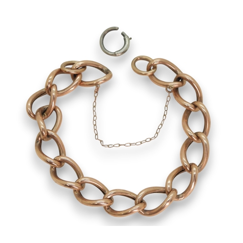 795 - A 9ct rose gold curb chain, with a white metal (probably silver) clasp, weight without the clasp 9.5... 