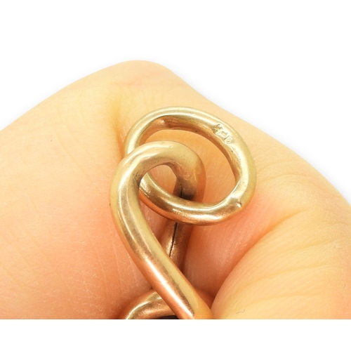 795 - A 9ct rose gold curb chain, with a white metal (probably silver) clasp, weight without the clasp 9.5... 