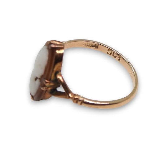 797 - A well carved shell cameo in a yellow metal mount, a similar cameo ring, size L, and a yellow metal ... 