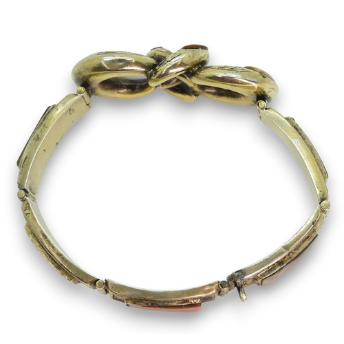 800 - A gilded white metal Scottish agate inlaid knot bracelet, length 16cm, weight 20.4gms