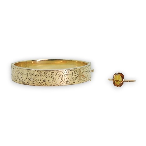 801 - A 9ct gold citrine ring, size V1/2 weight 1.7gms,&nbsp;together with a&nbsp;gold plated bangle.