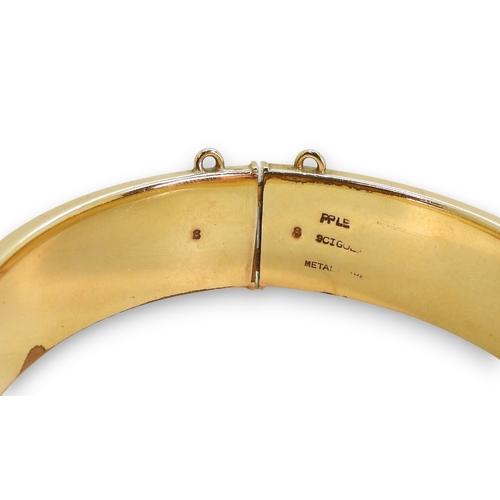 801 - A 9ct gold citrine ring, size V1/2 weight 1.7gms,&nbsp;together with a&nbsp;gold plated bangle.