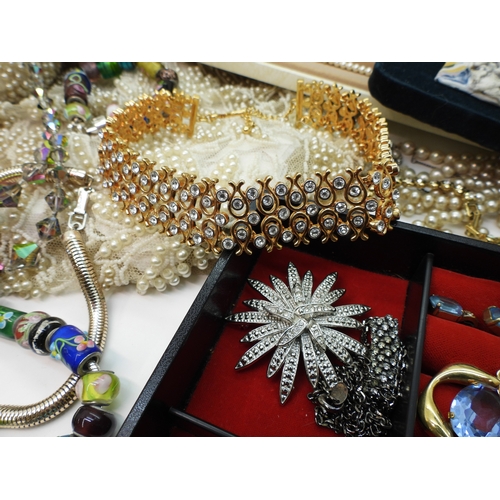 861 - A quantity of vintage heavily beaded net material, a retro diamante collar necklace, faux pearls, au... 
