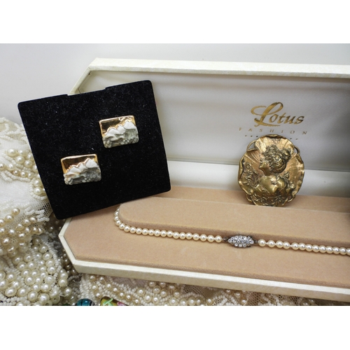 861 - A quantity of vintage heavily beaded net material, a retro diamante collar necklace, faux pearls, au... 