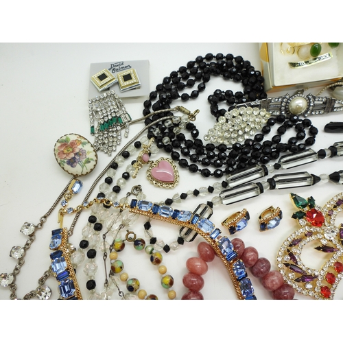 863 - A string of Art Deco glass beads, diamante crown brooch, good blue diamante necklace and earring set... 