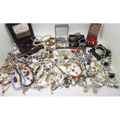 864 - A Vivienne Westwood pendant and chain, a gold plated engraved bangle, a Scottish style pendant by Ja... 