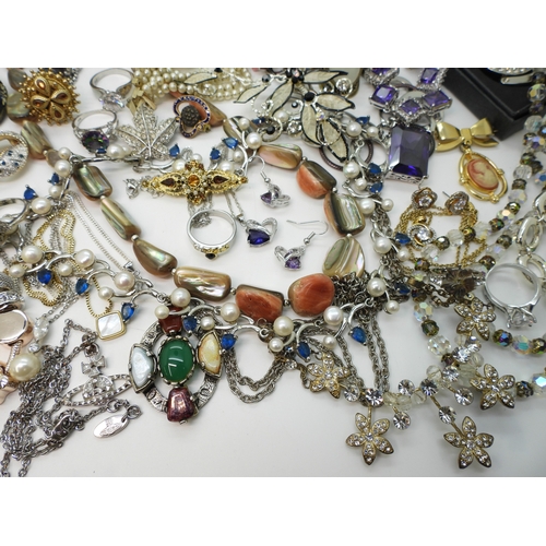 864 - A Vivienne Westwood pendant and chain, a gold plated engraved bangle, a Scottish style pendant by Ja... 