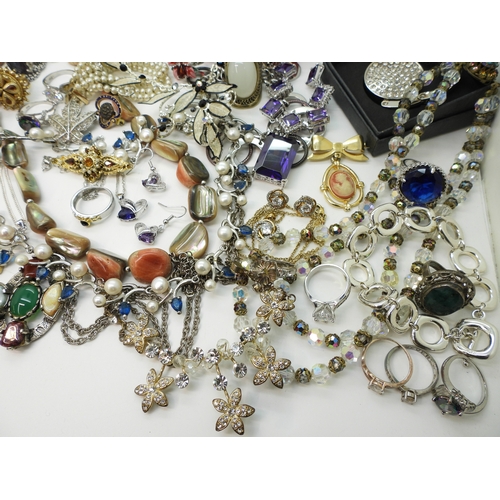 864 - A Vivienne Westwood pendant and chain, a gold plated engraved bangle, a Scottish style pendant by Ja... 